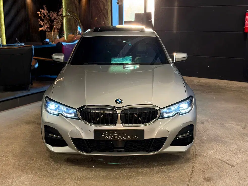 BMW 3-serie 320i High Executive uit 2020, foto 4