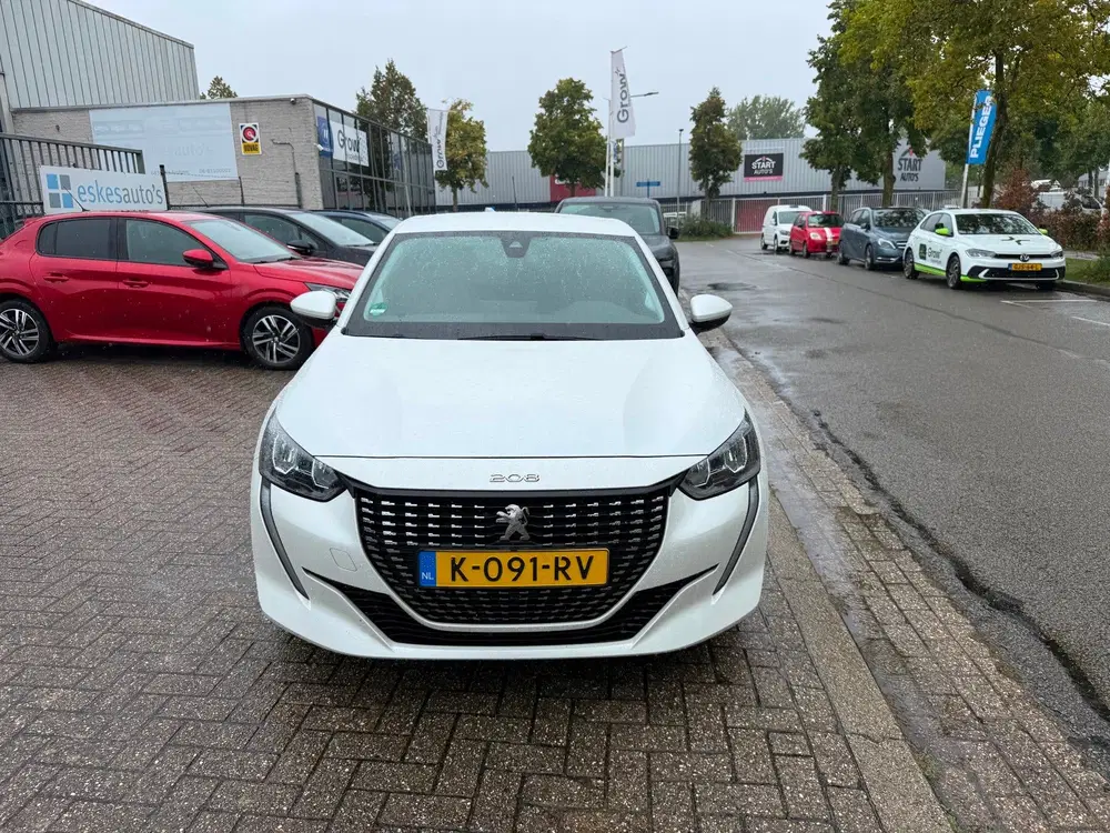 Peugeot 208 1.2 PureTech Allure Automaat uit 2021, foto 4