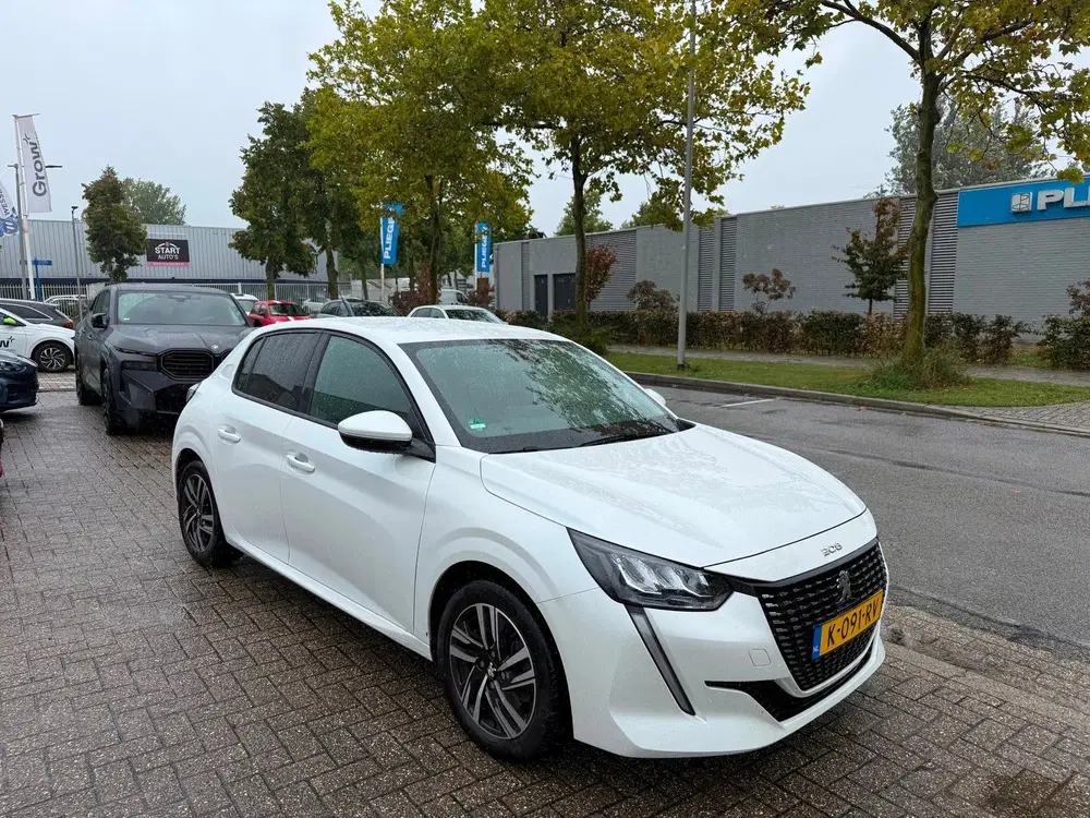 Peugeot 208 1.2 PureTech Allure Automaat uit 2021, foto 5