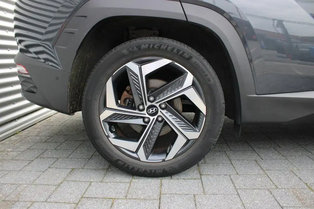 Hyundai TUCSON 1.6 T-GDI HEV Premium Sky uit 2023, foto 13