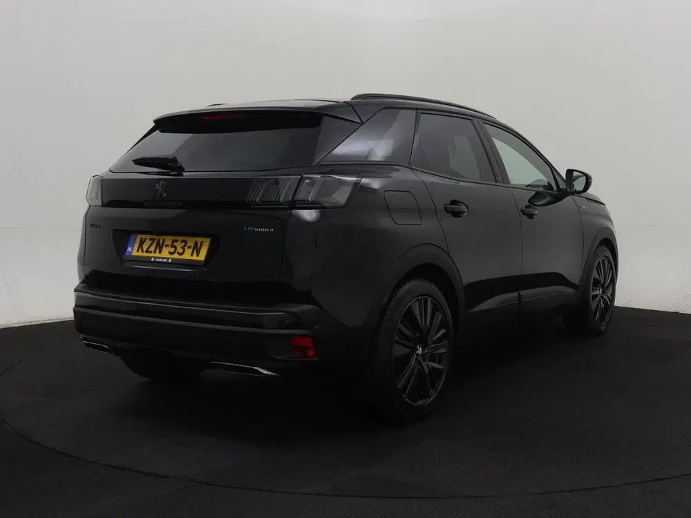 Peugeot 3008 1.6 HYbrid 4x4 300pk GT Black Pack Pano uit 2022, foto 2