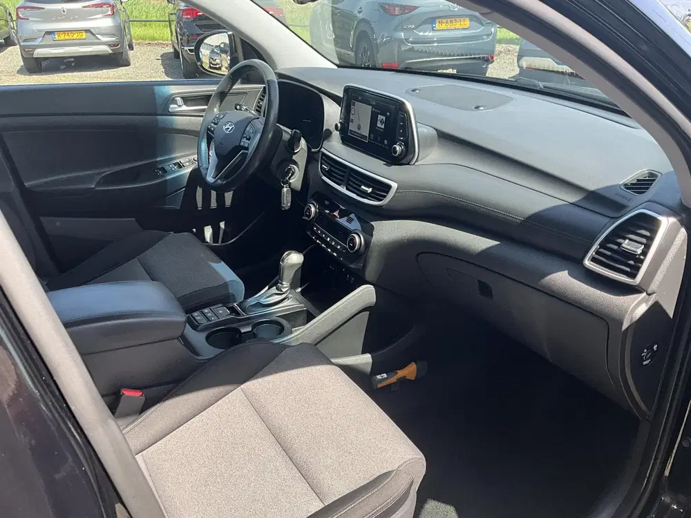 Hyundai TUCSON 1.6 T-GDI Comfort Trekhaak uit 2019, foto 11
