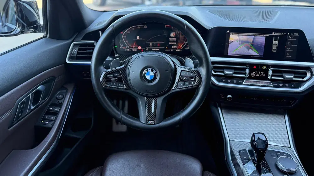 BMW 3-serie 320i High Executive Edition M Sport Camera uit 2019, foto 11