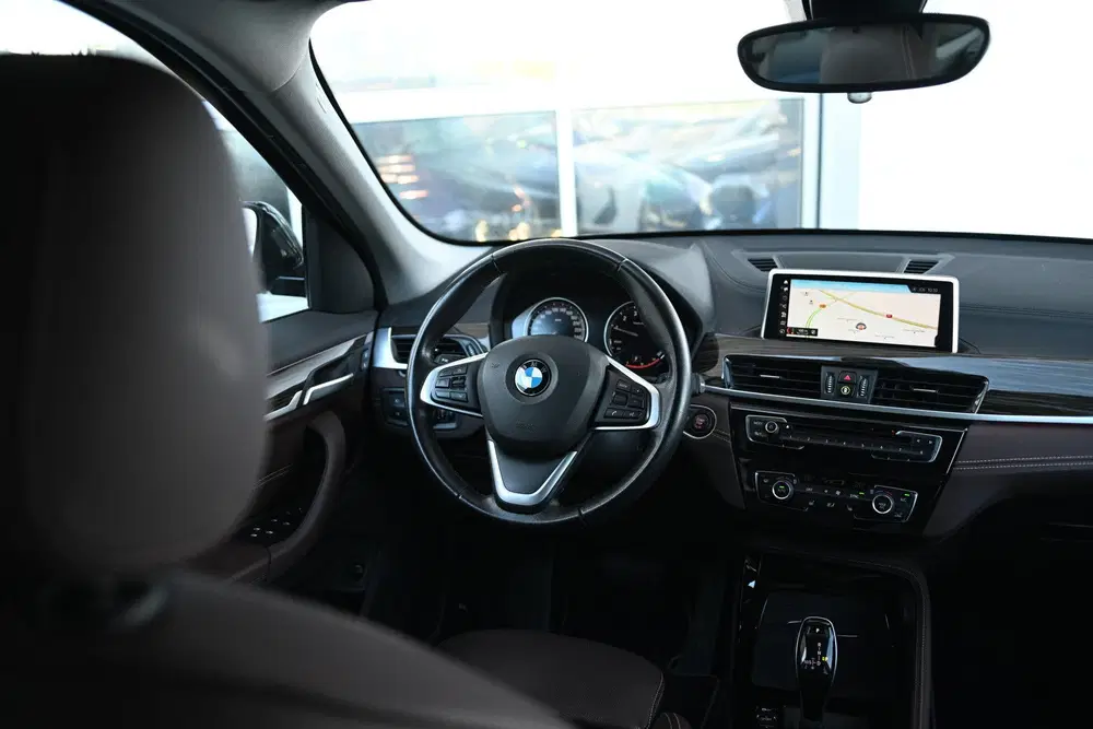 BMW X1 sDrive18i Sport Line Automaat uit 2019, foto 11