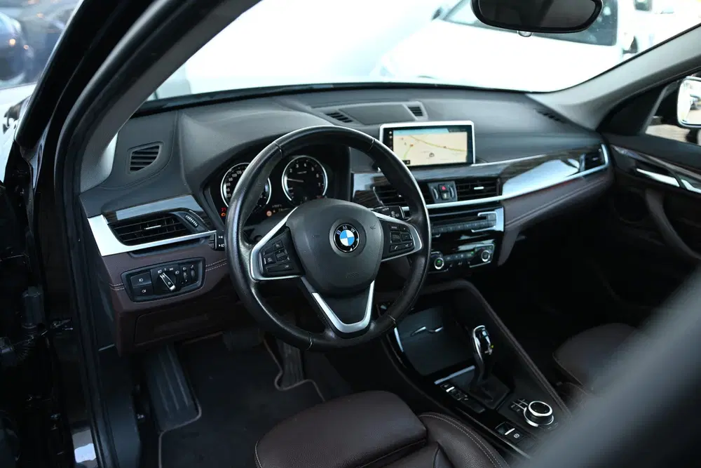 BMW X1 sDrive18i Sport Line Automaat uit 2019, foto 7