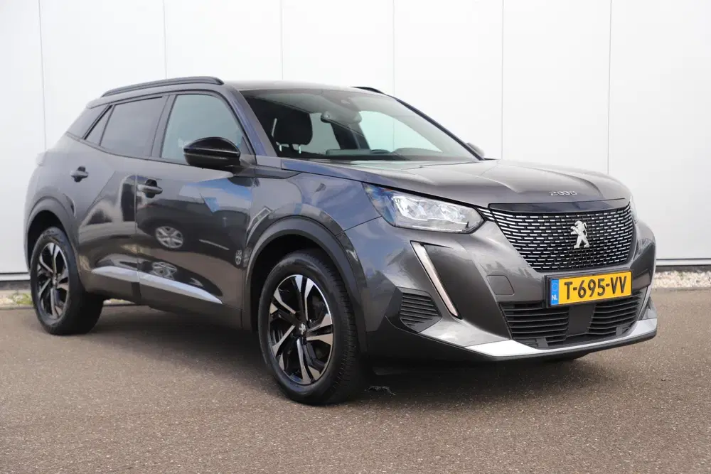 Peugeot 2008 1.2 PureTech Allure 102PK Half Leder Navig uit 2023, foto 3