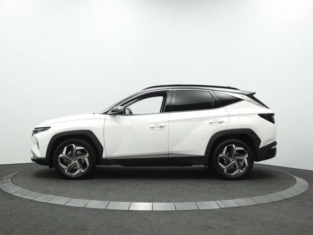 Hyundai TUCSON 1.6 T-GDI HEV Premium uit 2022, foto 11