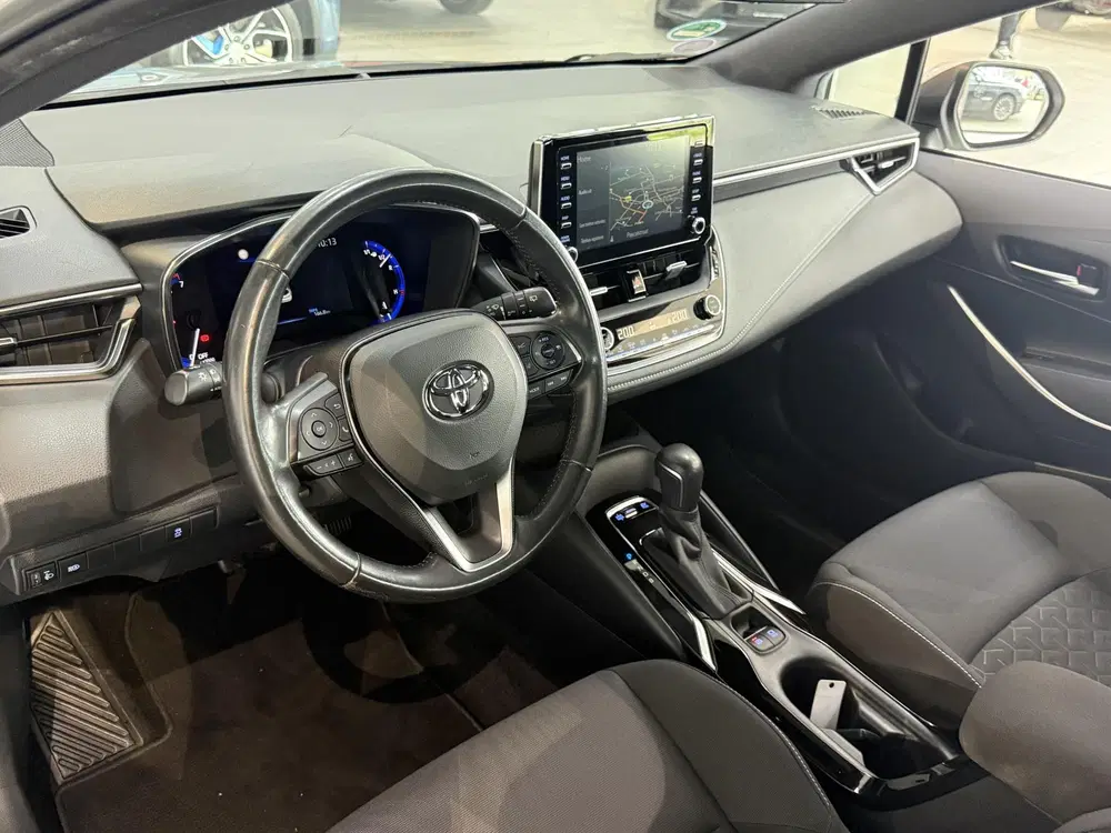 Toyota Corolla 1.8 Hybrid First Edition Trekh uit 2019, foto 11