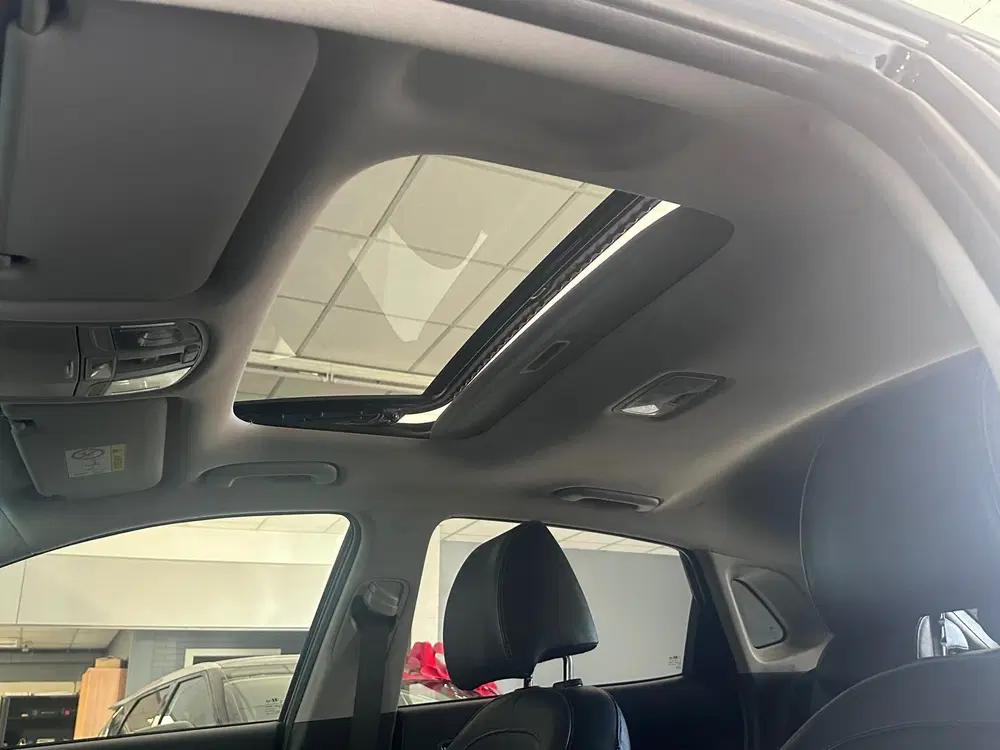 Hyundai KONA EV Premium Sky 64 kWh FASE 3 SOH 100% PANO uit 2020, foto 14