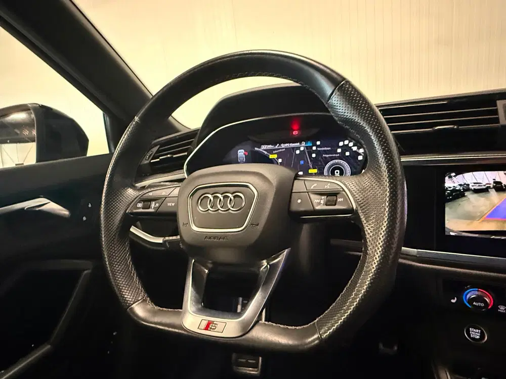 Audi Q3 45 TFSI e Edition uit 2021, foto 12