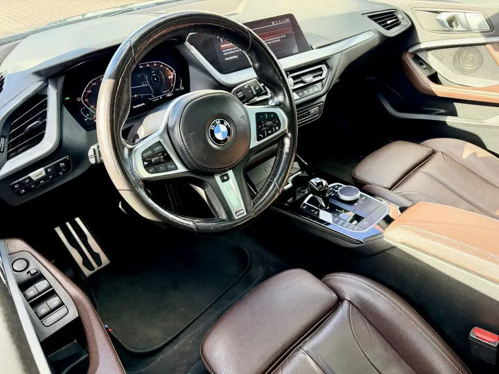 BMW 1-serie 118i Business ed. Panodak uit 2022, foto 10