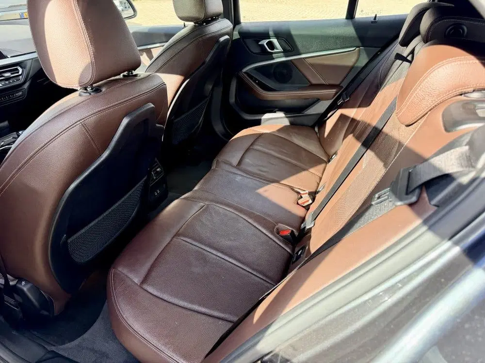 BMW 1-serie 118i Business ed. Panodak uit 2022, foto 11