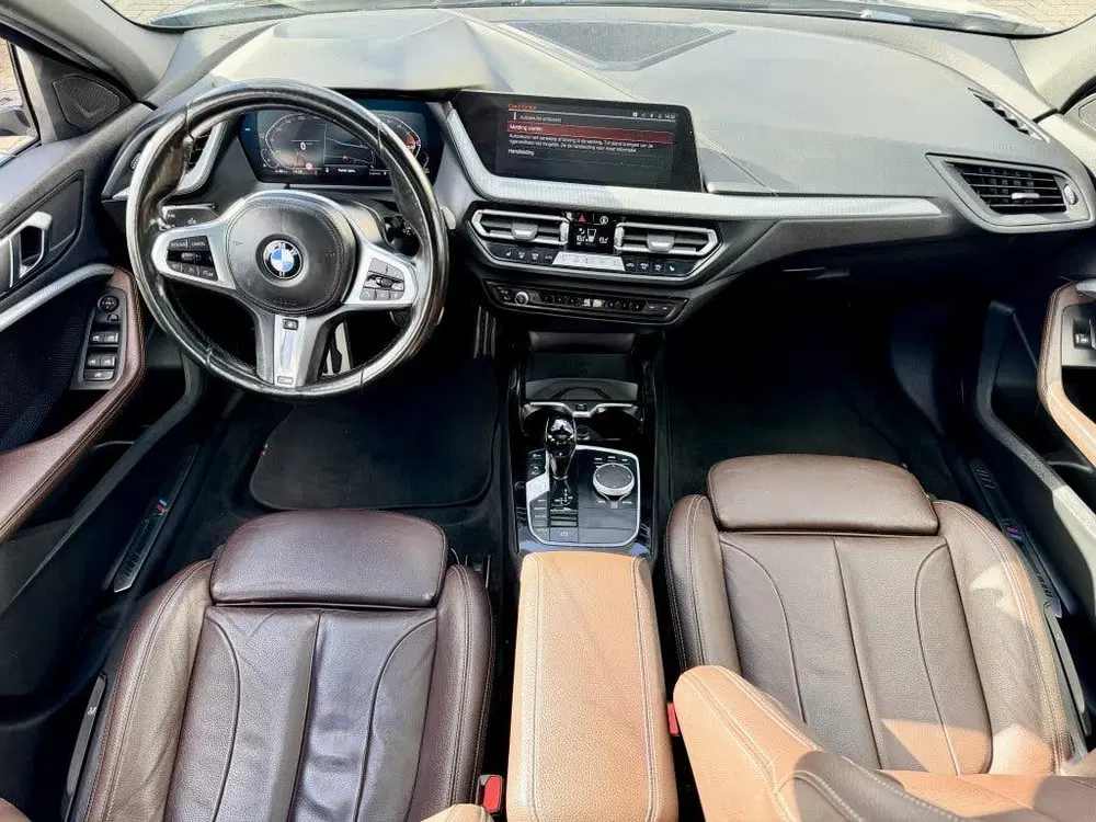 BMW 1-serie 118i Business ed. Panodak uit 2022, foto 12