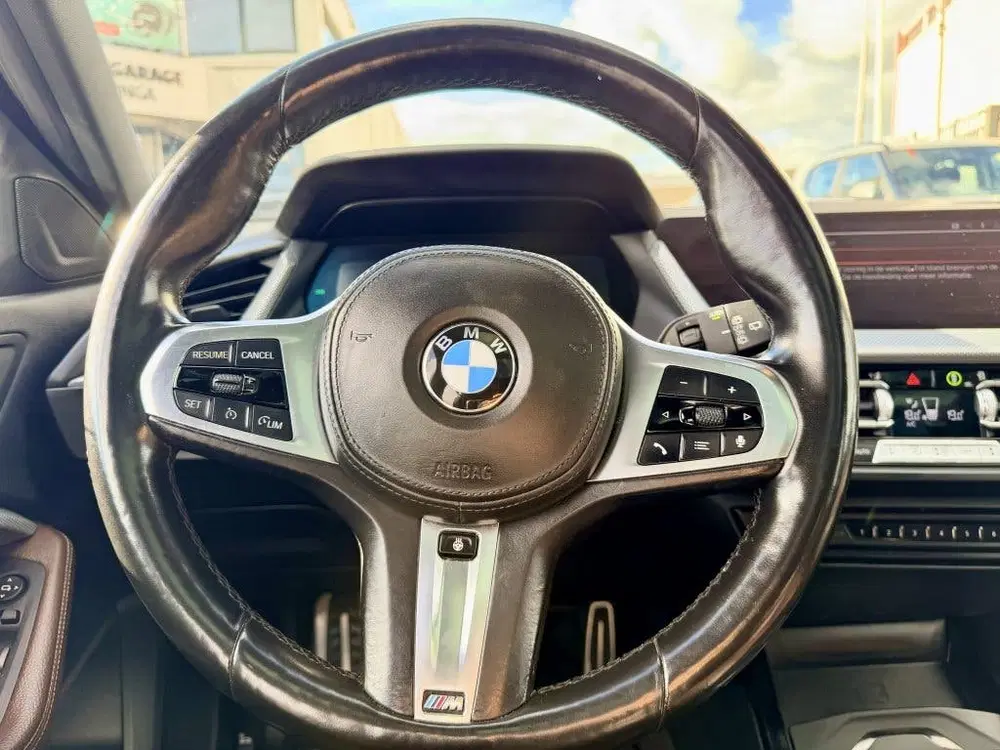 BMW 1-serie 118i Business ed. Panodak uit 2022, foto 15