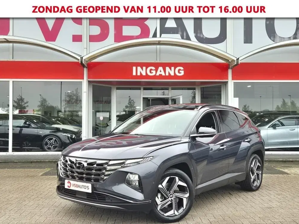 Hyundai TUCSON 1.6 TGDI AUT. HYBRIDE 230PK EXECUTIVE LEER uit 2021