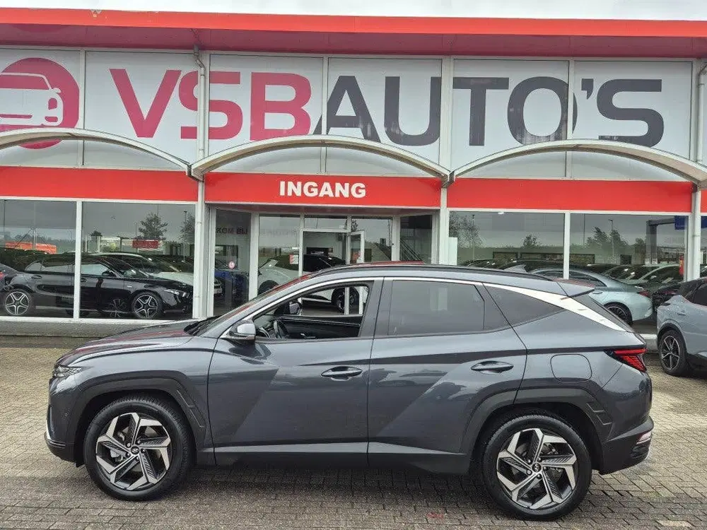 Hyundai TUCSON 1.6 TGDI AUT. HYBRIDE 230PK EXECUTIVE LEER uit 2021, foto 2