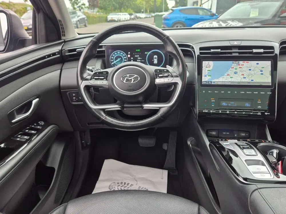 Hyundai TUCSON 1.6 TGDI AUT. HYBRIDE 230PK EXECUTIVE LEER uit 2021, foto 6