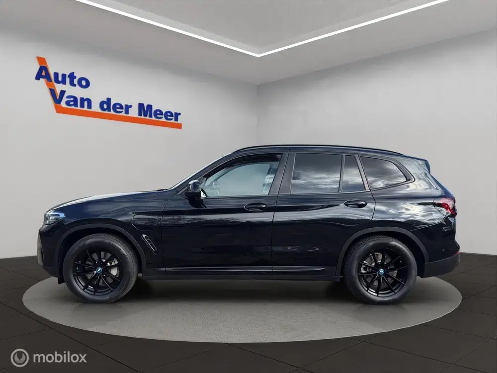 BMW X3 xDrive30e uit 2023, foto 14