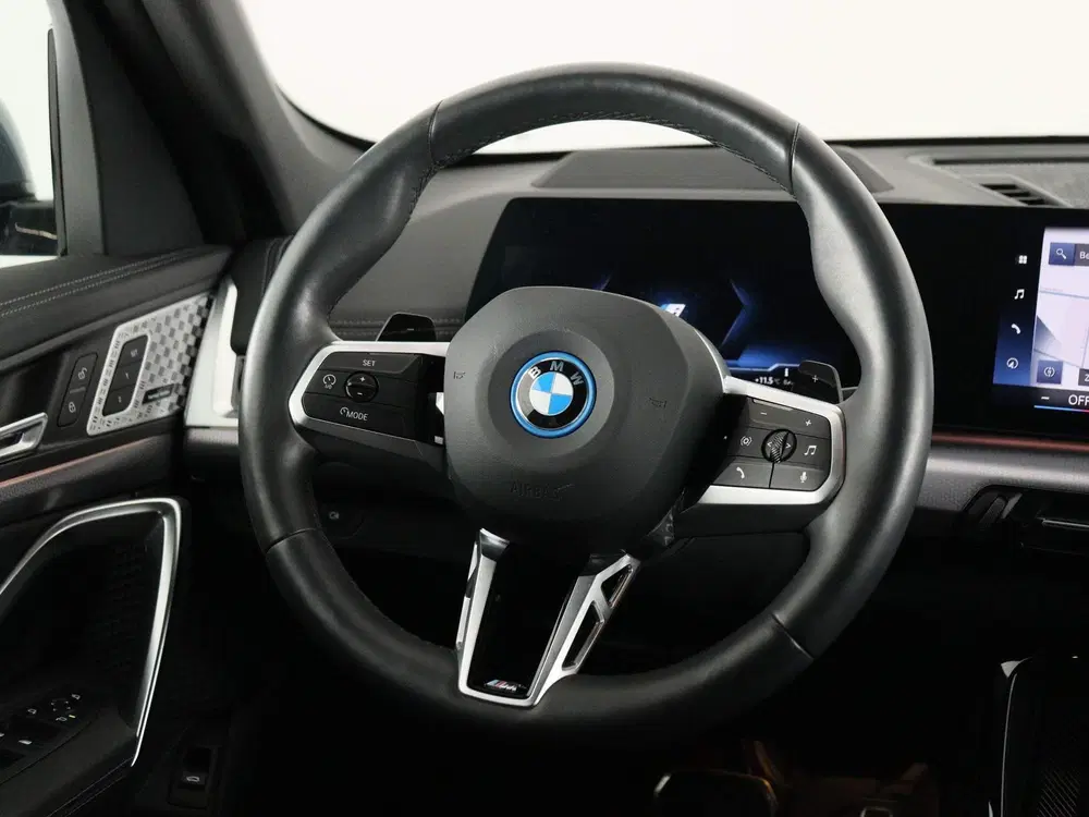 BMW X1 xDrive30e SoH 100% (bj 2023 uit 2023, foto 2