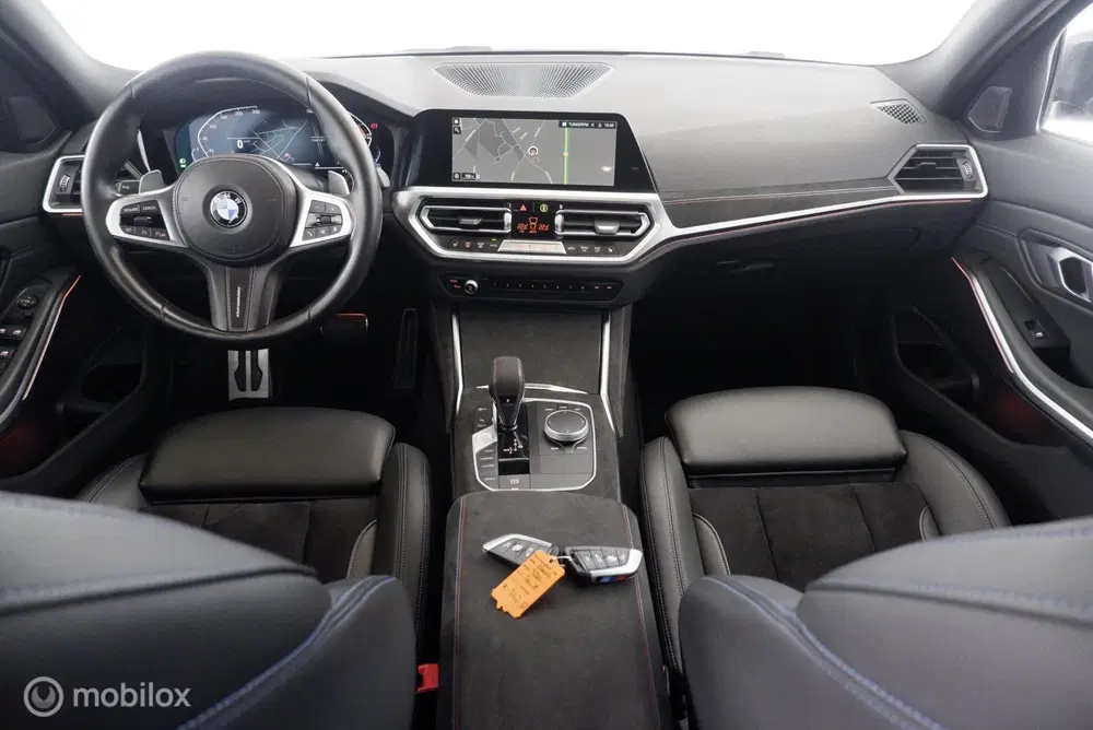 BMW 3-serie 320i M Sport Executive Edition ShadowLine uit 2021, foto 13