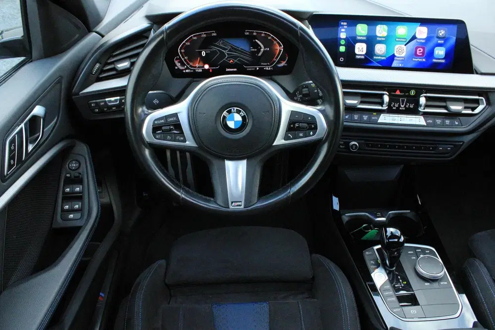 BMW 1-serie 120i High Executive M Sport Pano Cam Kuips uit 2022, foto 14