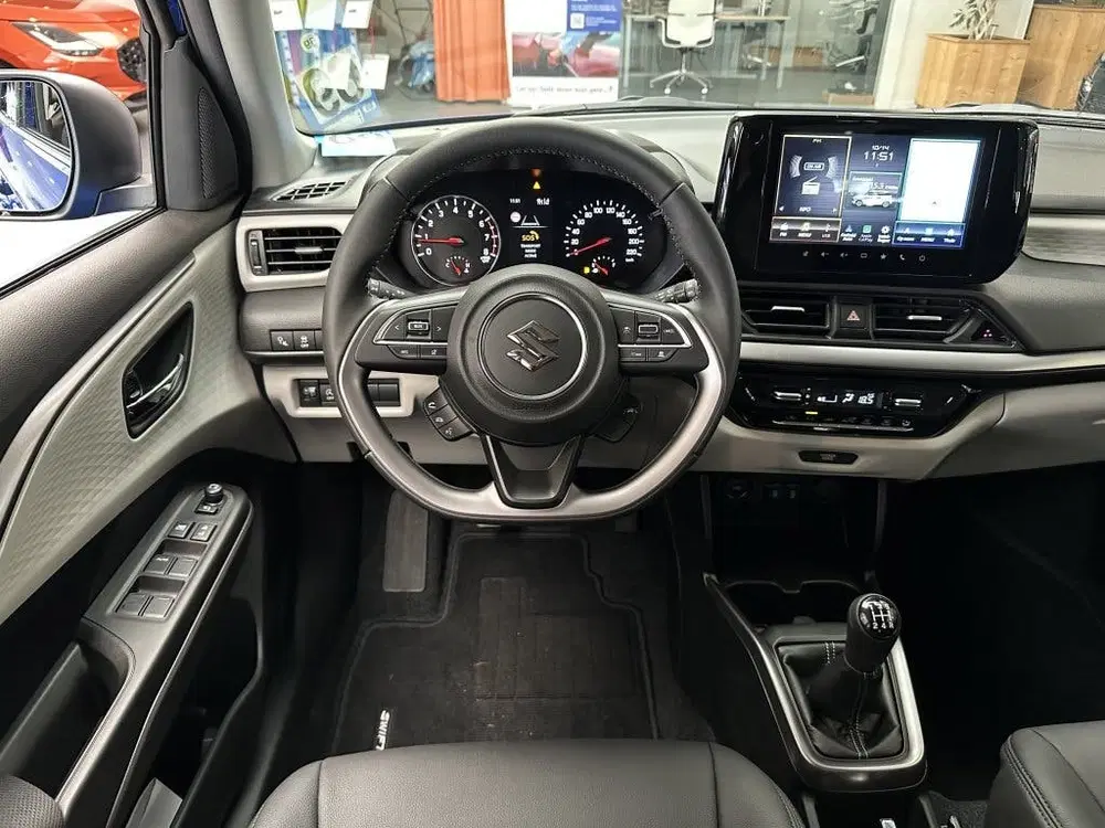 Suzuki Swift 1.2 60 JAAR EDITIE [ SPECIALE BEKLEDING uit 2026, foto 2