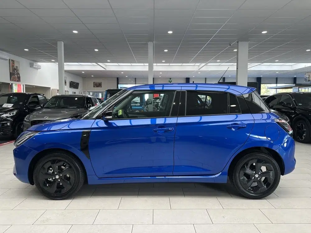 Suzuki Swift 1.2 60 JAAR EDITIE [ SPECIALE BEKLEDING uit 2026, foto 7