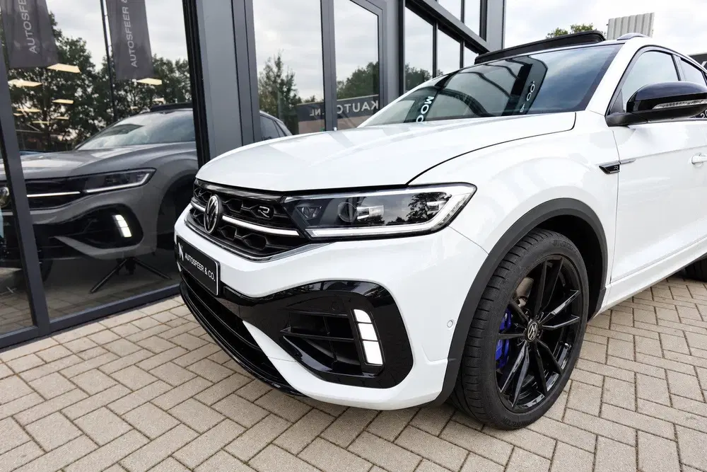 Volkswagen T-Roc 2.0 TSI 4Motion R AKRAPOVIC PANO KEYLESS V uit 2022, foto 11