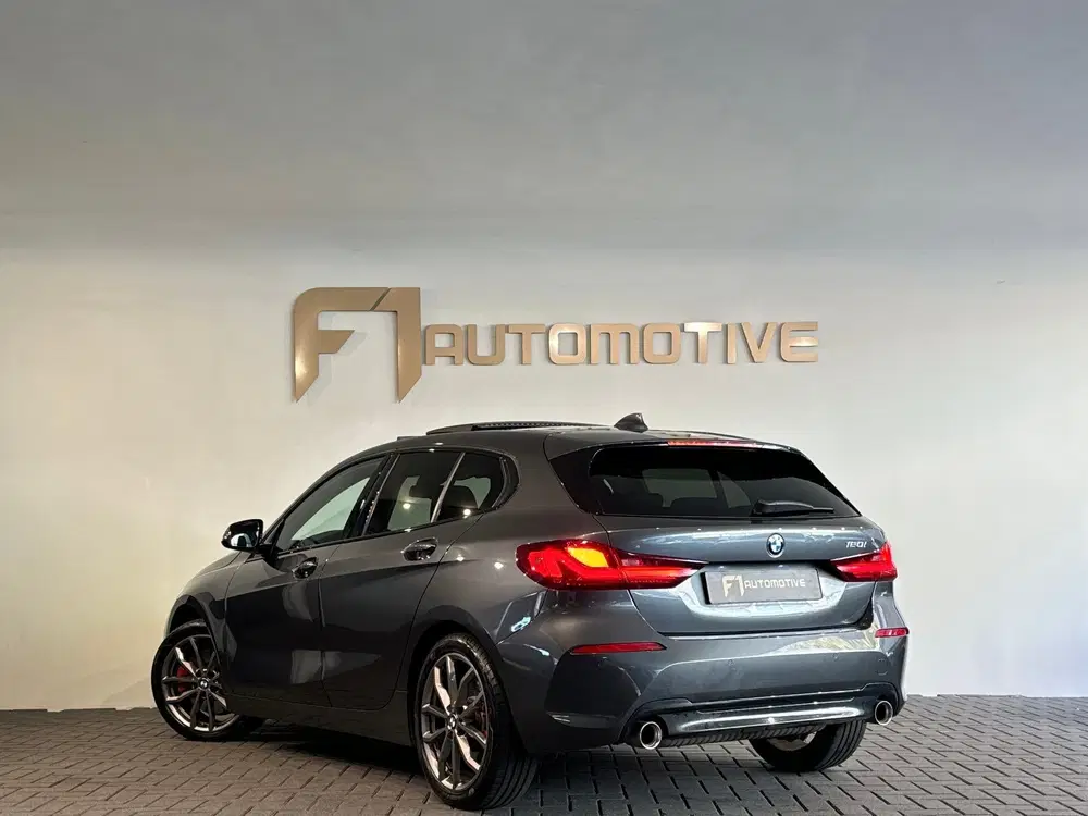 BMW 1-serie 120i High Executive Pano uit 2021, foto 6
