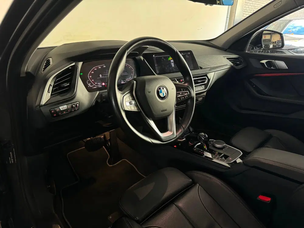 BMW 1-serie 120i High Executive Pano uit 2021, foto 9