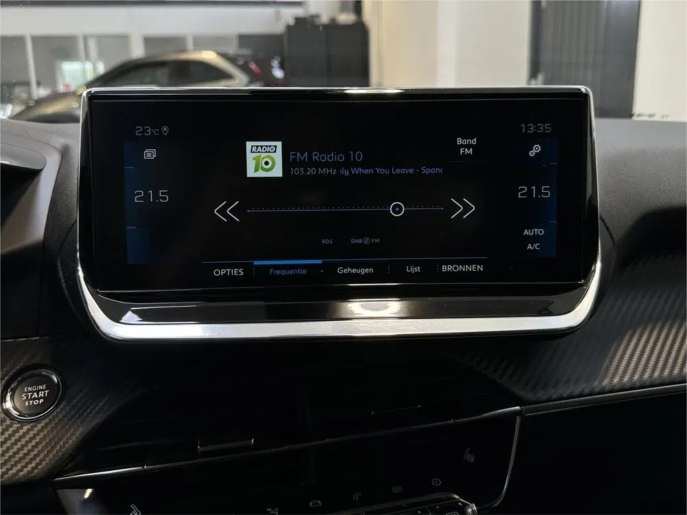Peugeot 208 1.2 PureTech Allure Pack Automaat uit 2021, foto 13