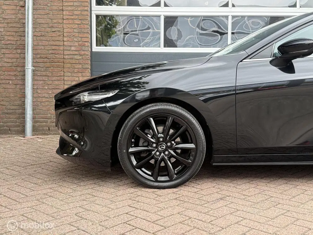 Mazda 3 2.0 e-SkyActiv-X M Hybrid 180 Luxury AWD L uit 2020, foto 12