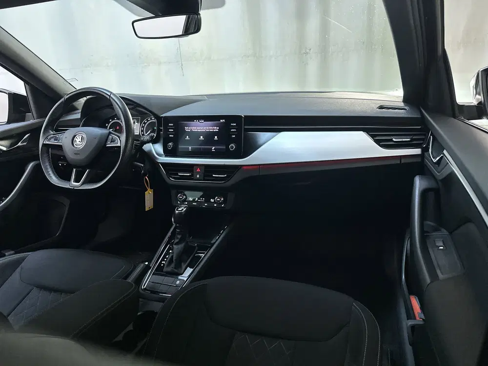 Skoda Kamiq 1.0 TSI 116pk DSG Sport Business Stoelverw uit 2020, foto 2
