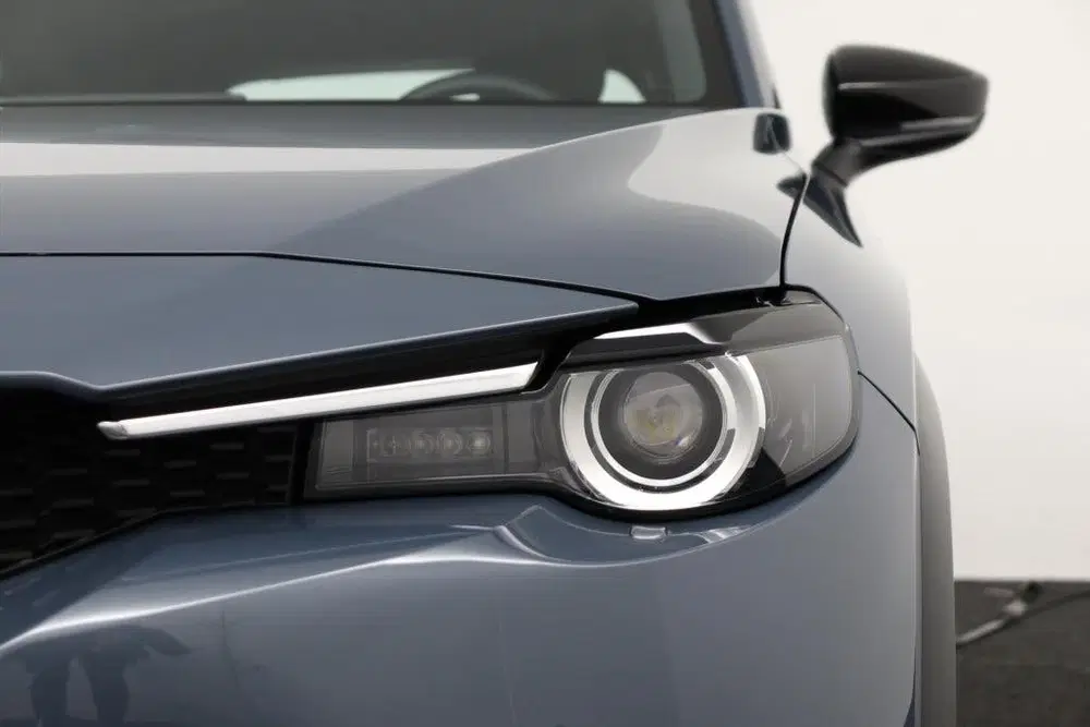 Mazda MX-30 E-SKYACTIV R-EV EXCLUSIVE-LINE AUTOMAAT EC uit 2024, foto 2