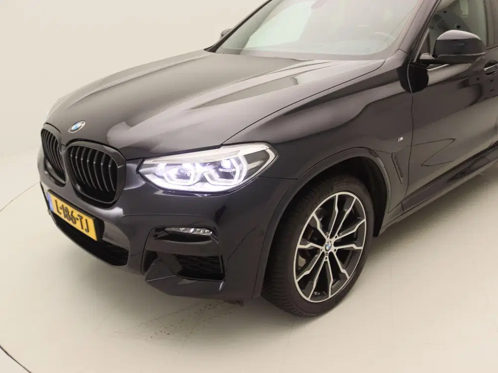 BMW X4 xDrive20i High Executive uit 2021, foto 15