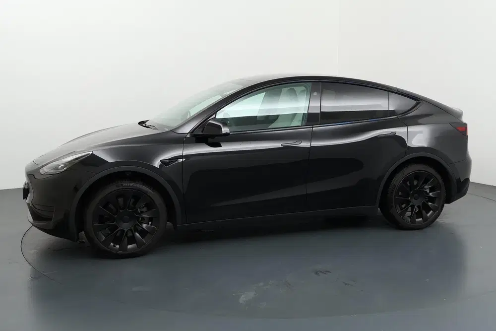 Tesla Model Y RWD 58 kWh Stijlvol en stil onderweg met v uit 2024, foto 13