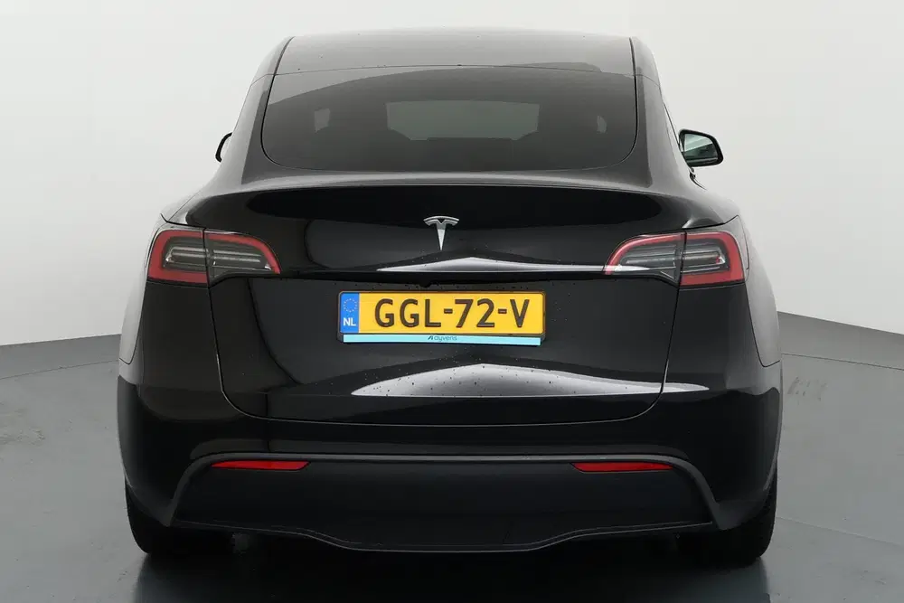 Tesla Model Y RWD 58 kWh Stijlvol en stil onderweg met v uit 2024, foto 14