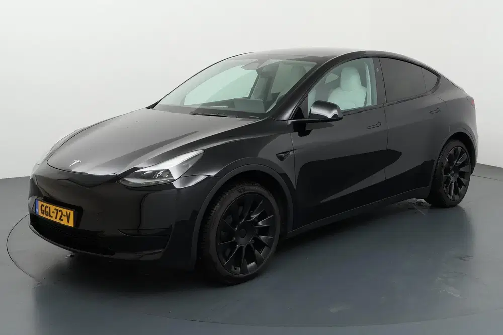 Tesla Model Y RWD 58 kWh Stijlvol en stil onderweg met v uit 2024, foto 4