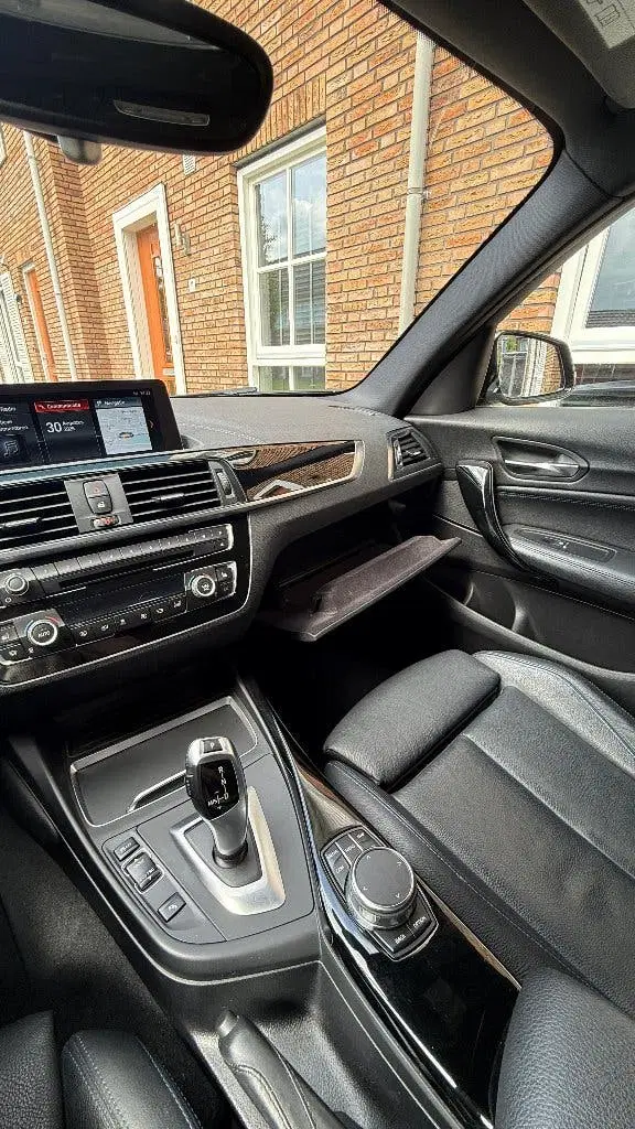 BMW 1-serie 118i 136pk Aut 2019 M sport High exutive Z uit 2019, foto 4