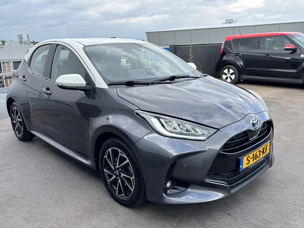 Toyota Yaris 1.5 Hybrid Executive Bi-tone edition Navig uit 2021, foto 6