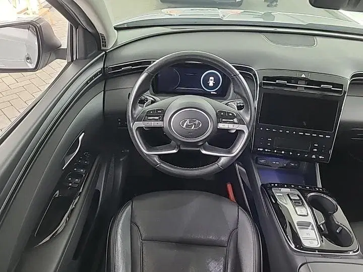 Hyundai TUCSON 1.6 T-GDI PHEV PREMIUM SKY 4WD I AUTOMAAT uit 2022, foto 4