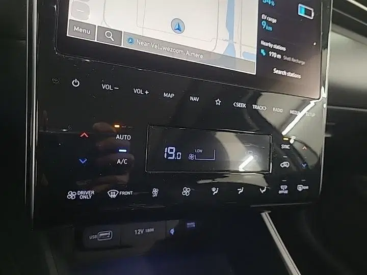 Hyundai TUCSON 1.6 T-GDI PHEV PREMIUM SKY 4WD I AUTOMAAT uit 2022, foto 9