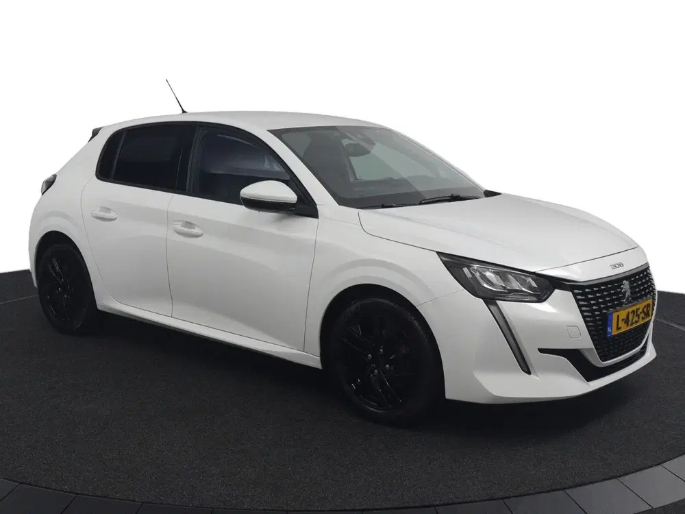Peugeot 208 1.2 100 PK Allure Pack uit 2021, foto 14