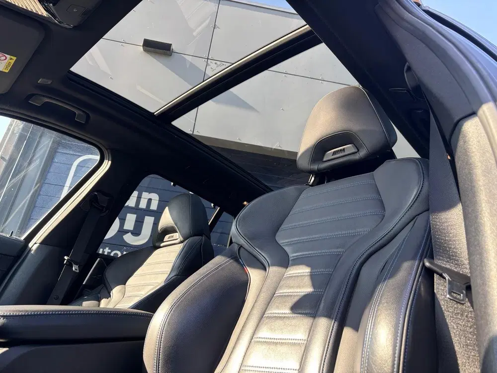 BMW X3 xDrive30e High Executive M-Sport Panoramad uit 2023, foto 11