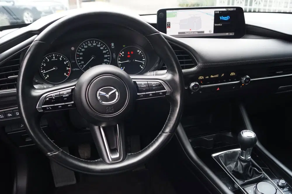 Mazda 3 2.0 e-SkyActiv-G M Hybrid 150 Exclusive-li uit 2024, foto 9