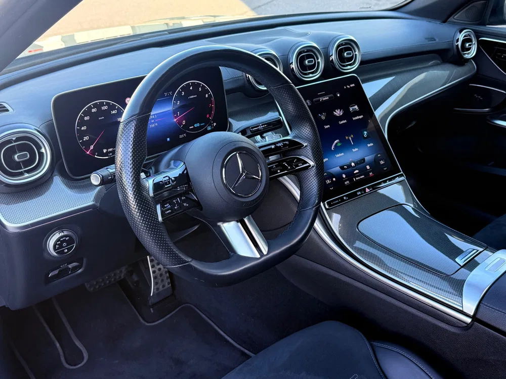 Mercedes-Benz C-Klasse 300 4MATIC AMG Line Pano l Ambient l Memor uit 2022, foto 10